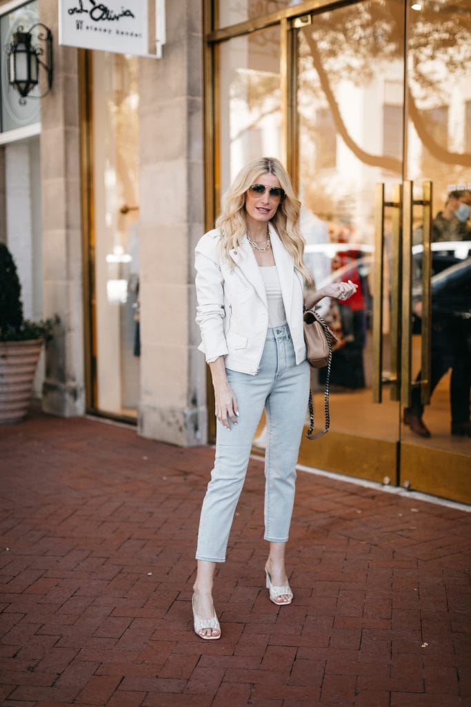 Dallas fashion blogger wearing light wash denim and a white blazer