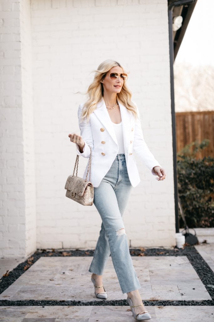 Dallas fashion blogger wearing a white blazer and light wash denim for spring