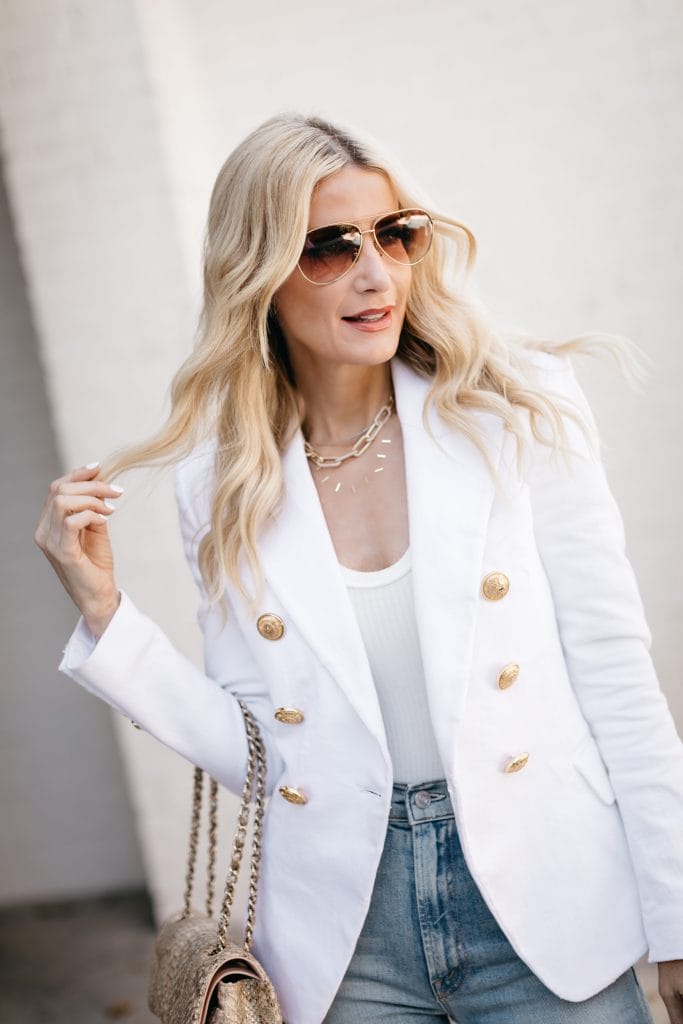 Style blogger wearing a Balmain blazer dupe and gold chain necklaces