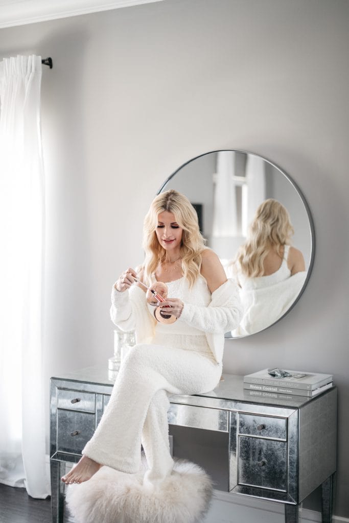 Dallas blogger So Heather wearing a cozy cardigan set and makeup to look younger