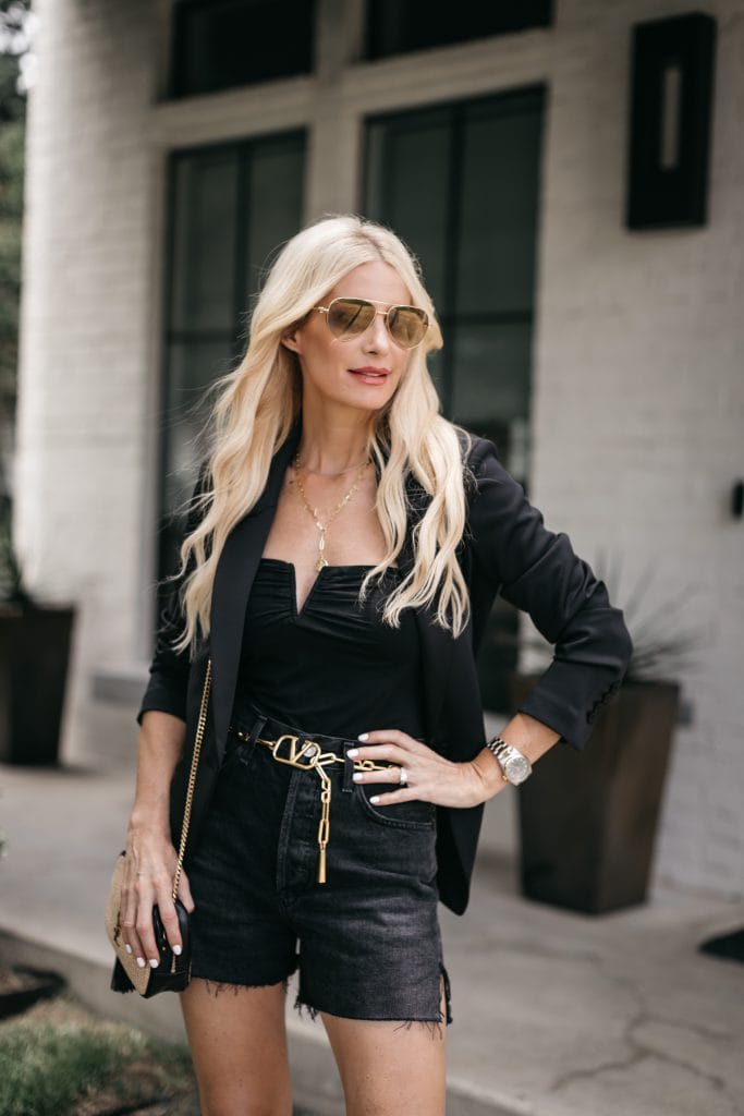 Dallas blogger wearing a black blazer and black denim shorts