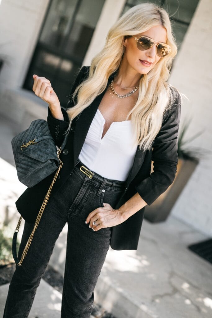 Dallas fashion blogger wearing a black blazer and black denim