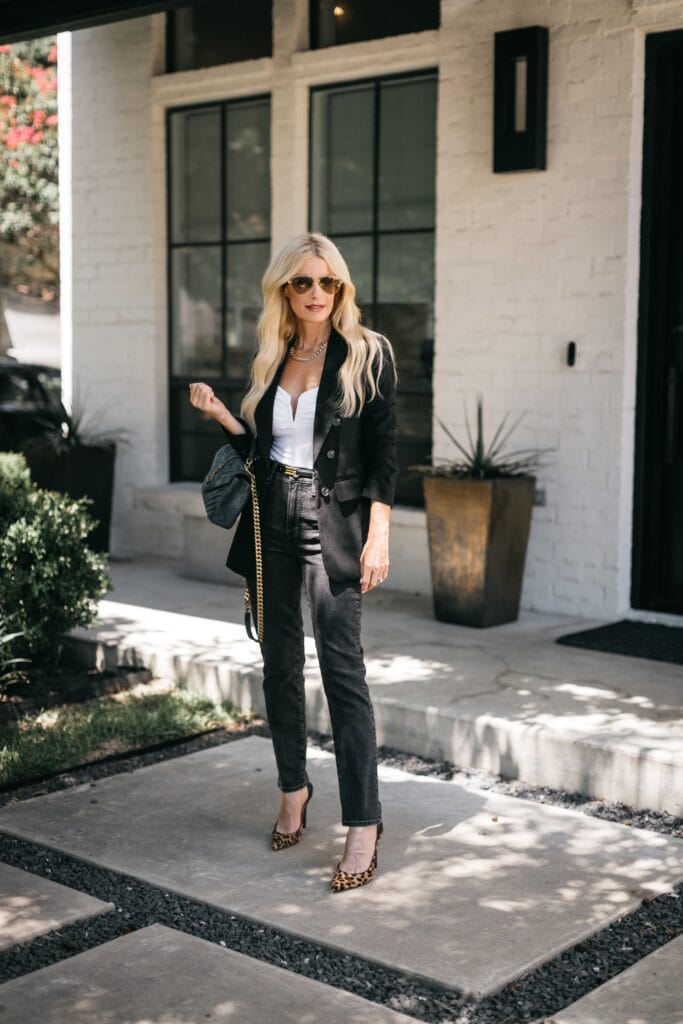 Dallas blogger wearing a black blazer and black denim
