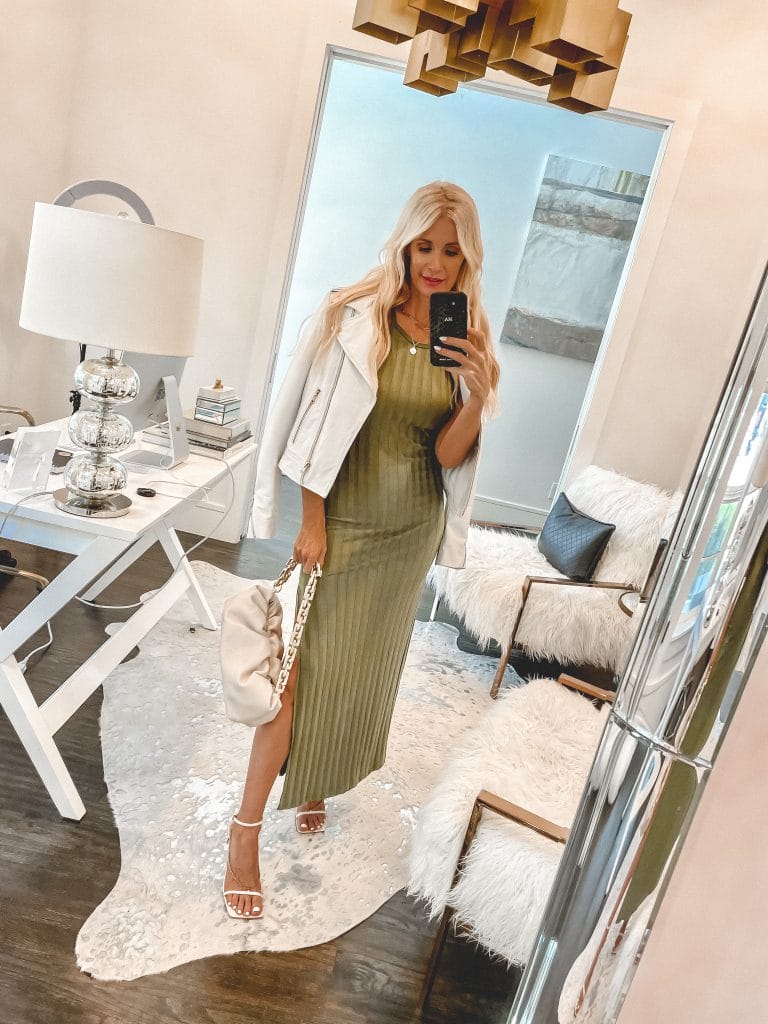 Dallas Fashion Blogger wearing a green ribbed maxi dress and a white leather jacket