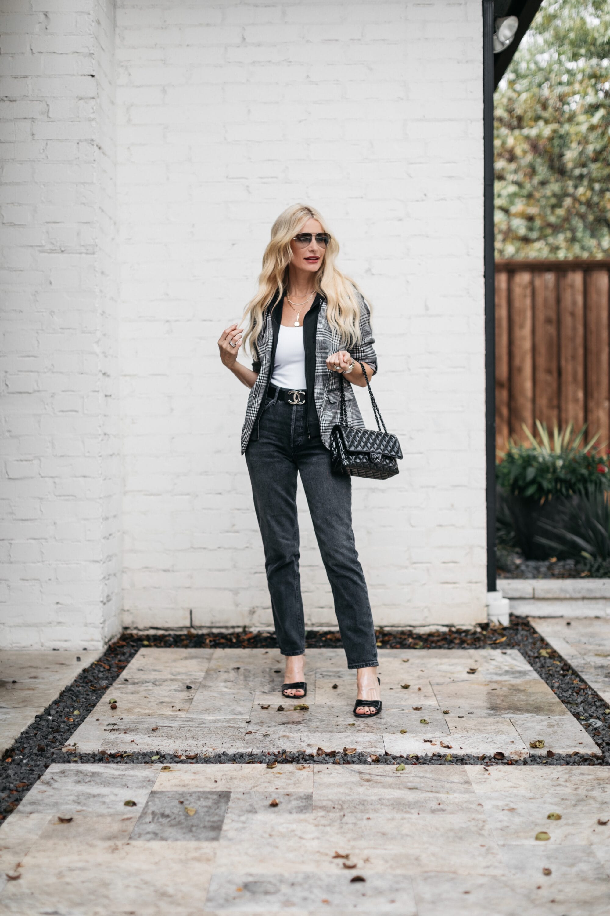 Dallas fashion blogger wearing a black and white check jacket