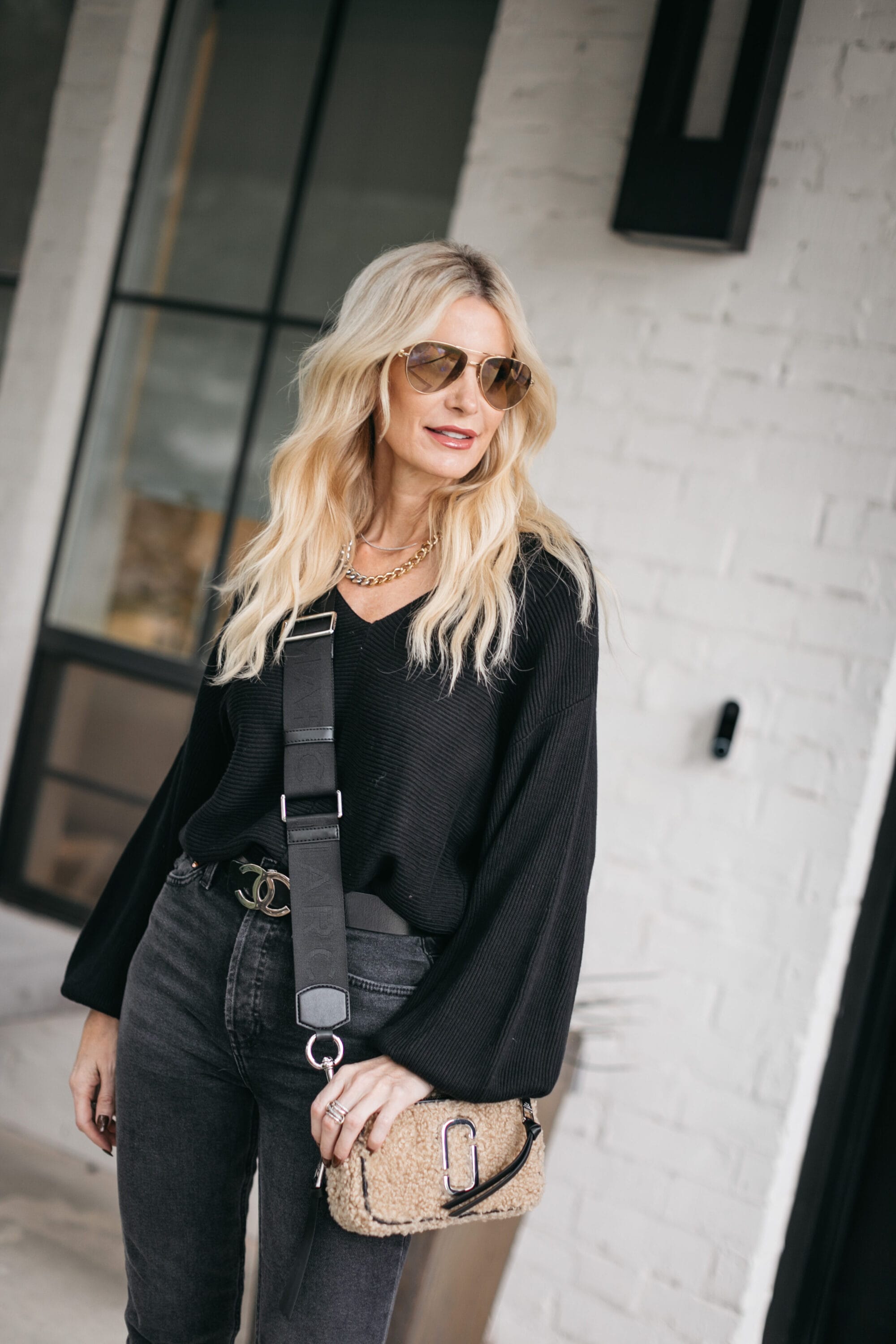 Dallas blogger wearing a black sweater and black denim