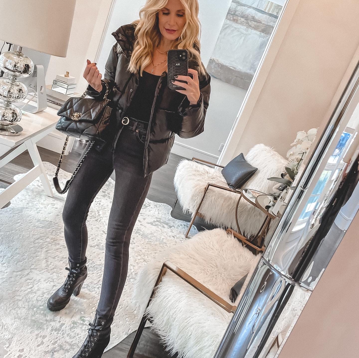 Dallas fashion blogger over 40 wearing faux leather puffer jacket