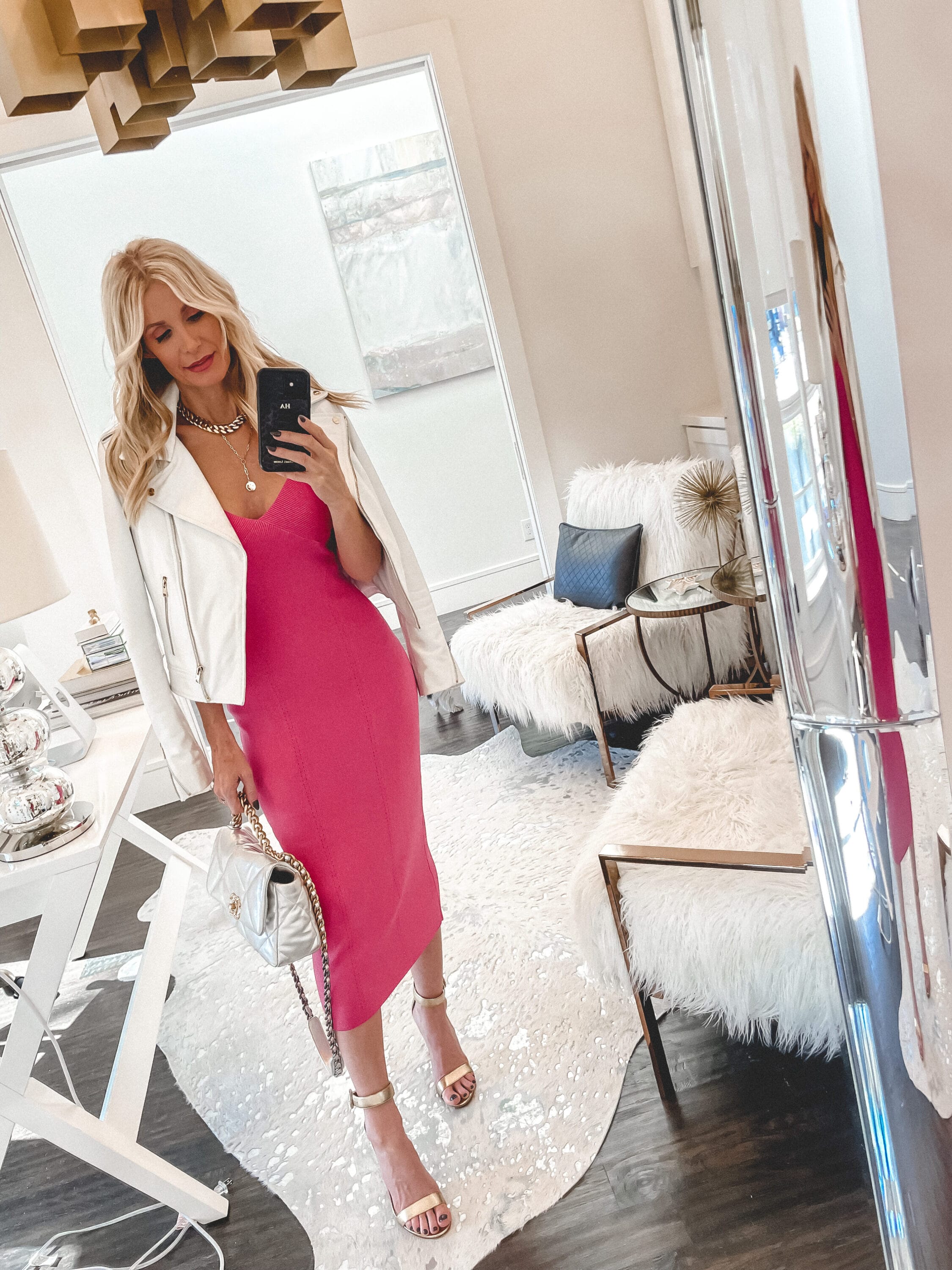 Dallas fashion blogger over 40 wearing chic date night look pink dress