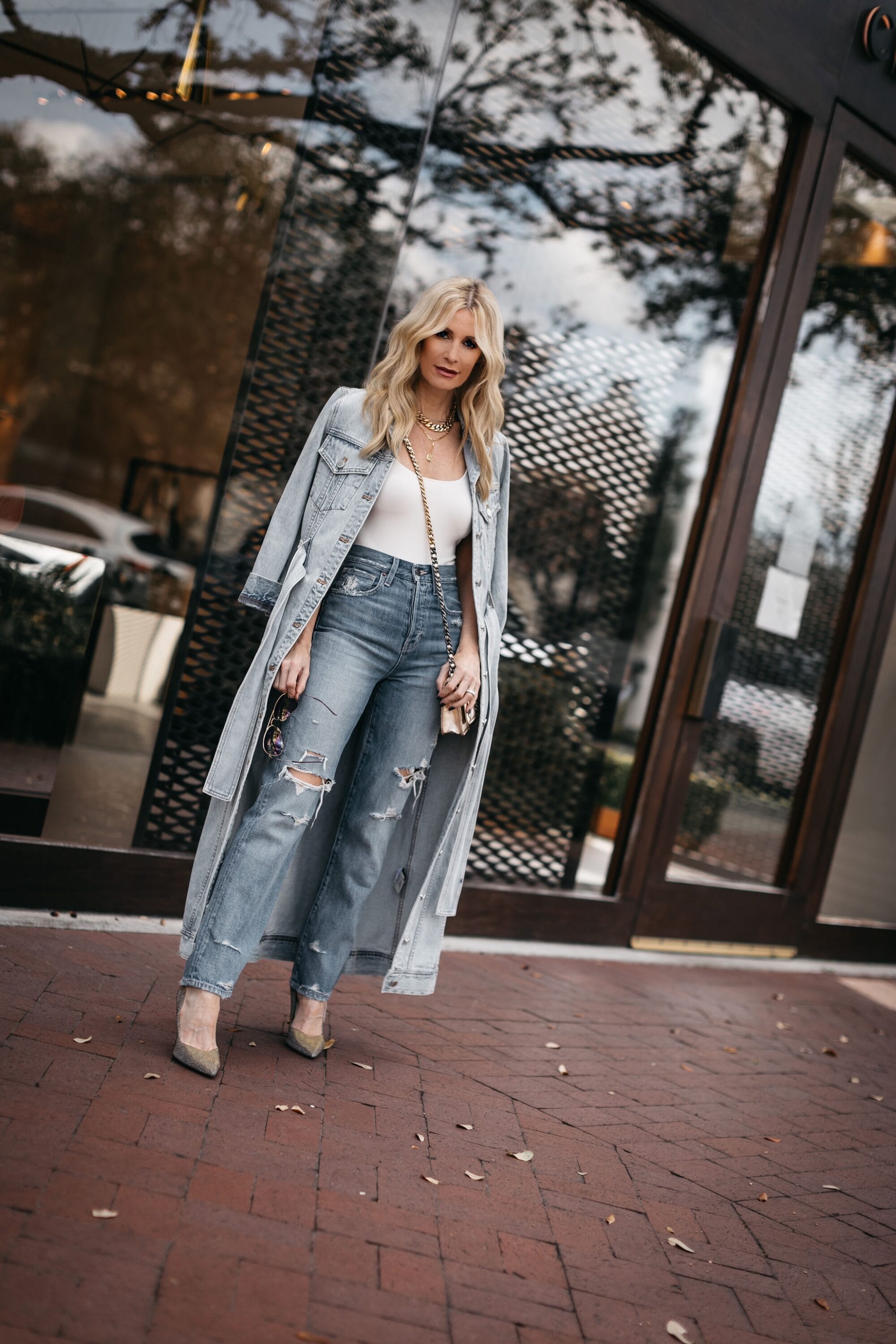 Dallas woman over 40 wearing denim trench coat
