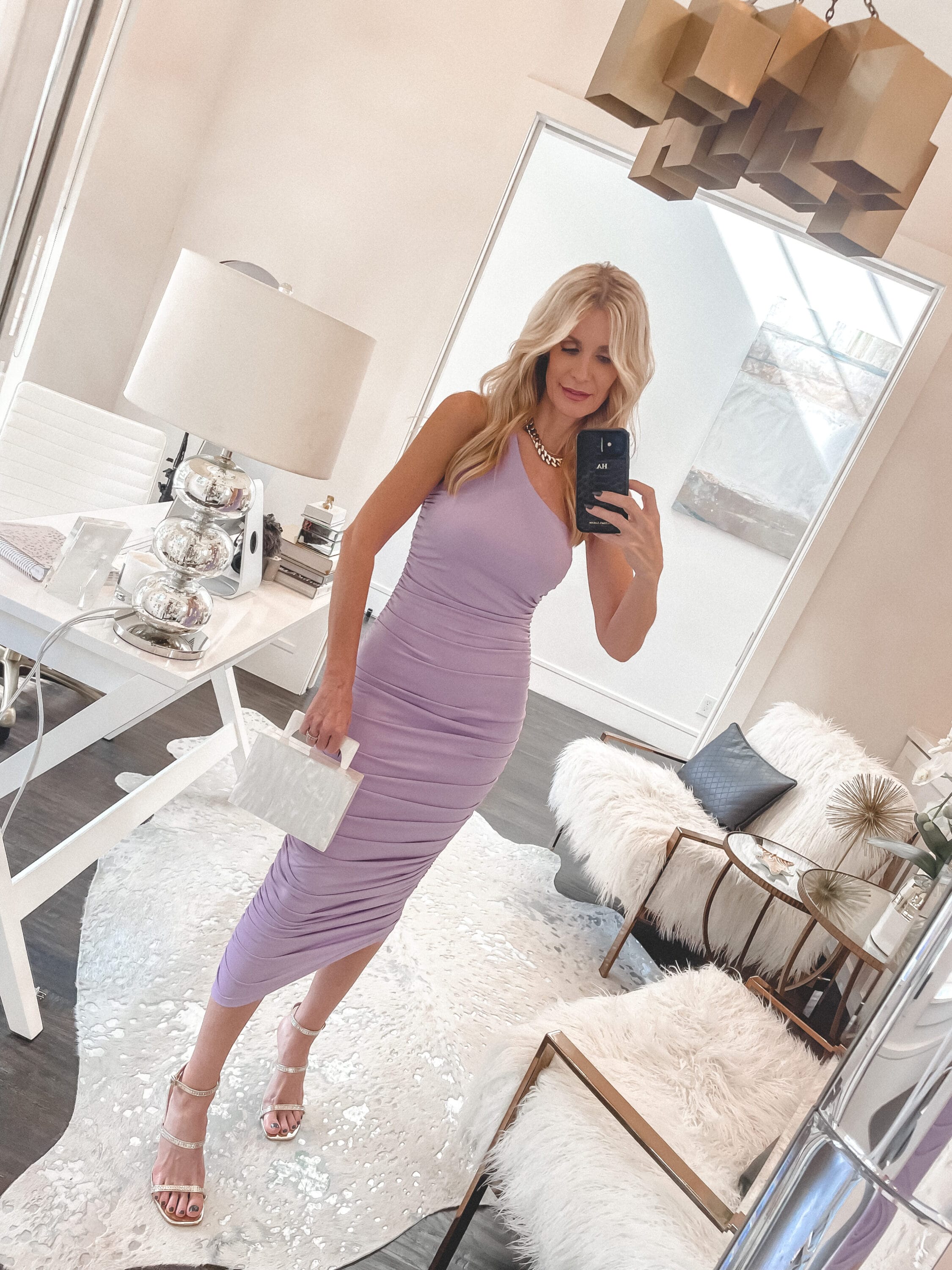 Dallas fashion blogger wearing purple designer dupe wedding guest dress