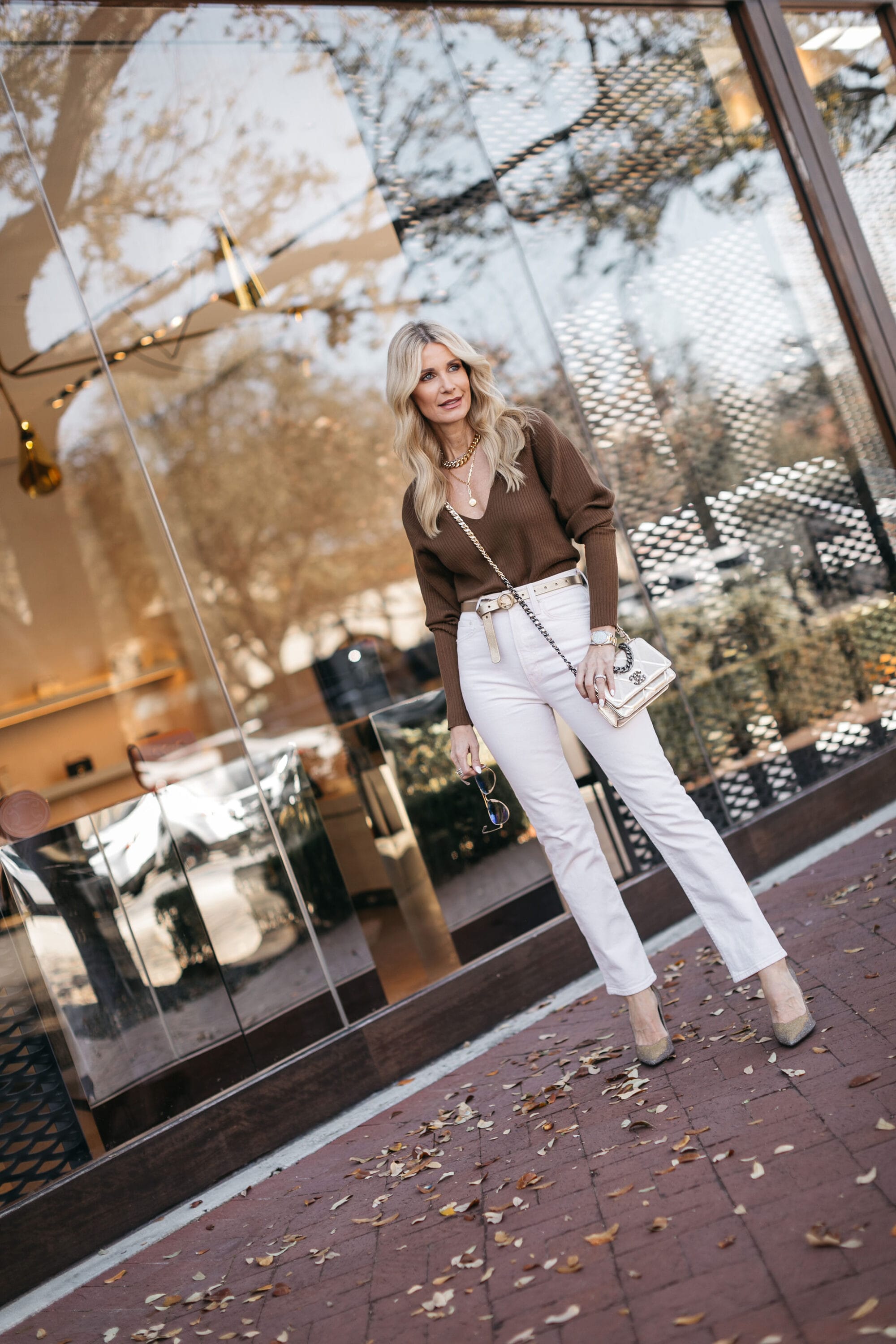 Dallas fashion blogger over 40 wearing white Jeans & brown long sleeve top