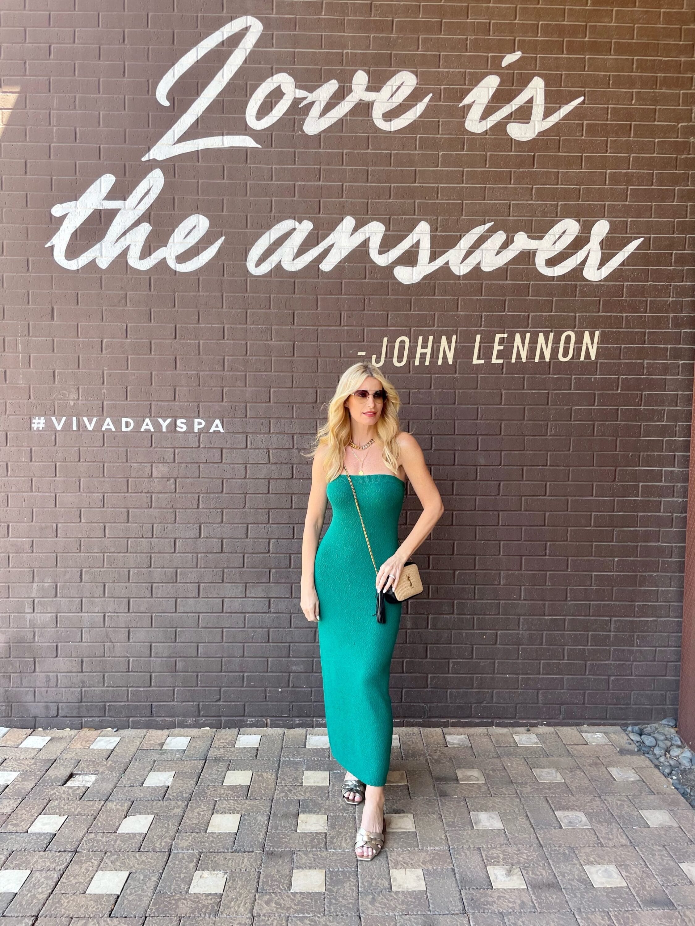 Dallas woman over 40 wearing hottest summer trends - green tube dress/ 