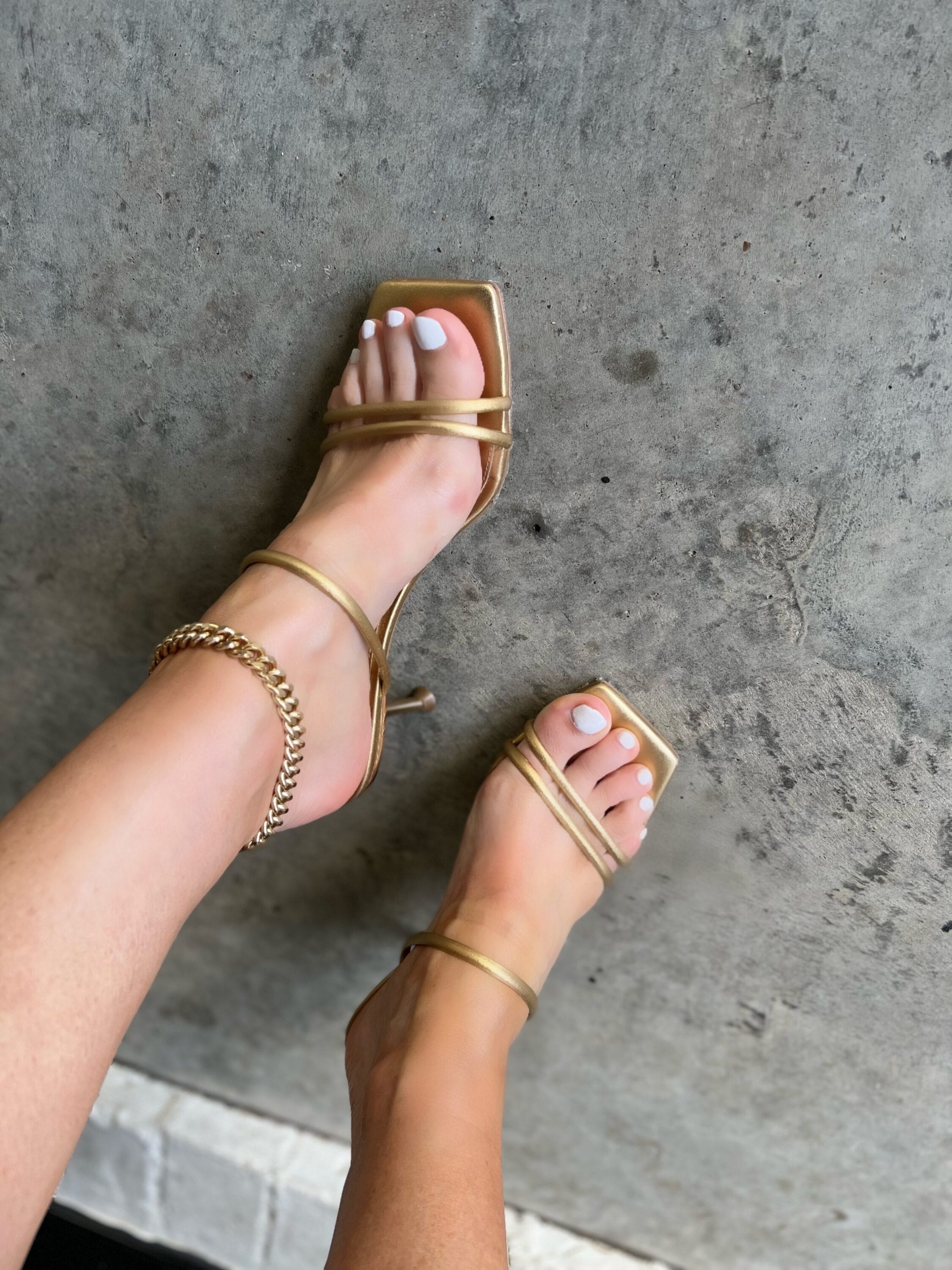 Dallas fashion blogger over 40 wearing gold strappy sandals