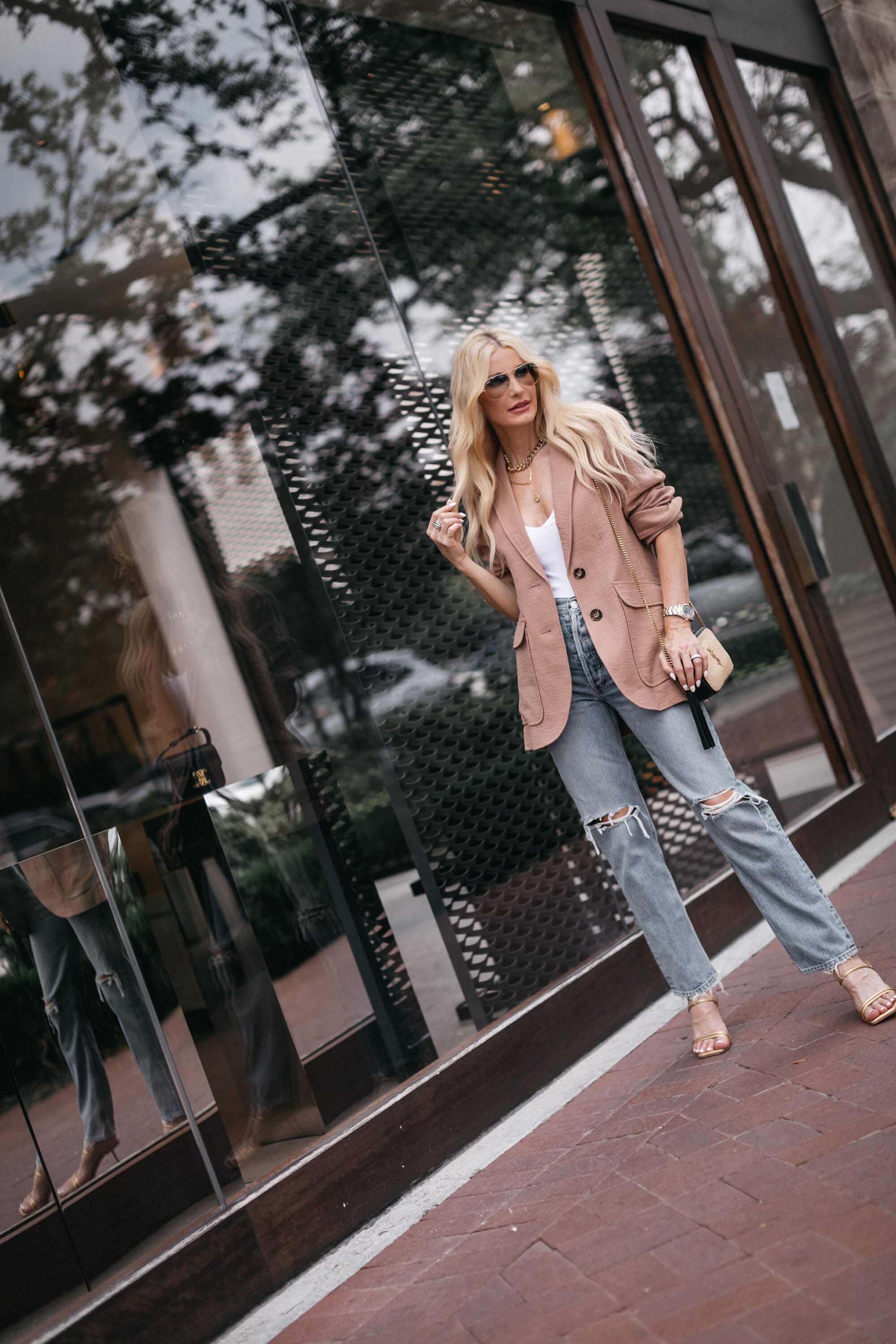 Dallas fashion blogger wearing oversized blazer with high-waist straight leg denim