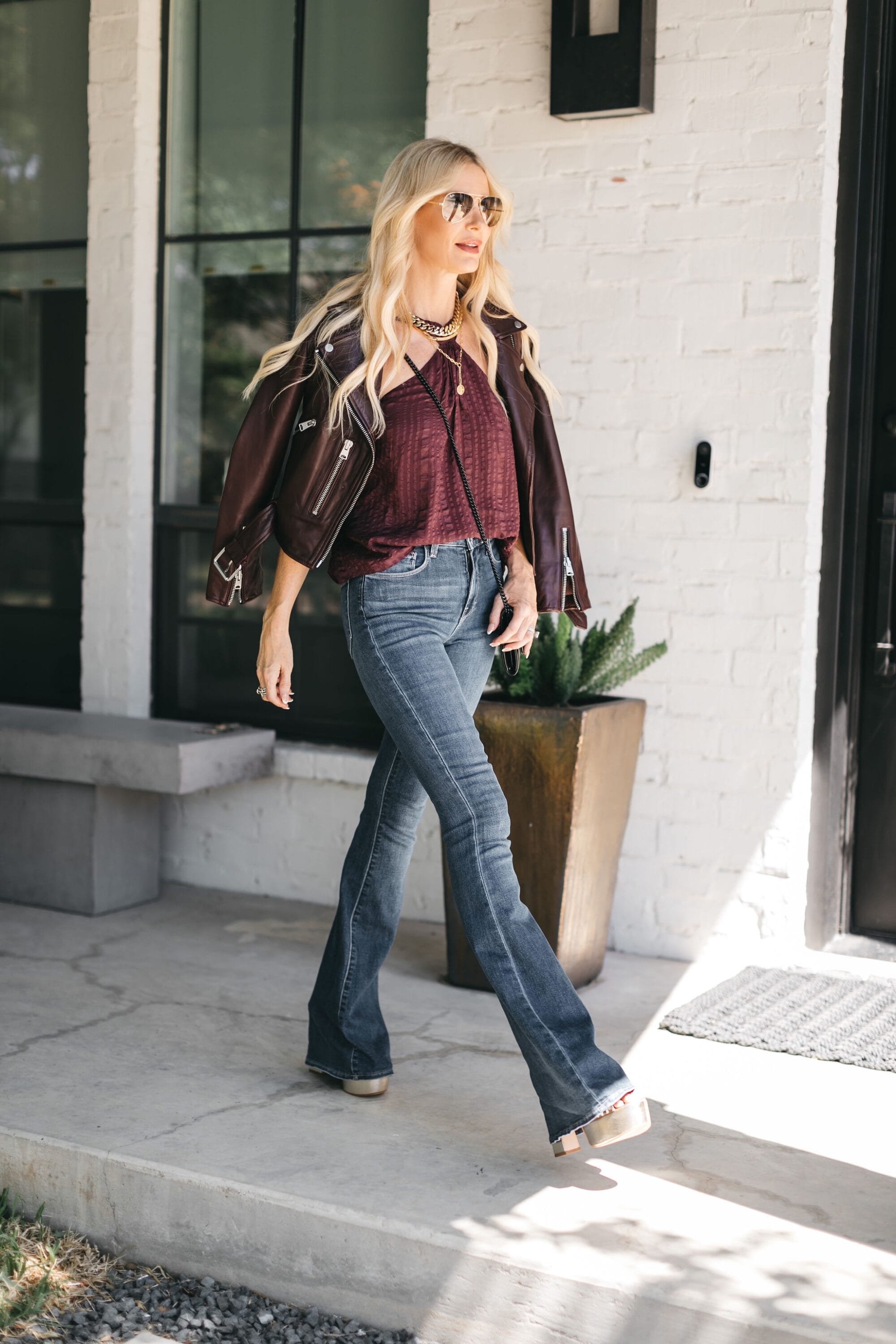 Over 40 fashion influencer wearing Marty Flare jeans from L'agence as one of the best selling items in 2022.
