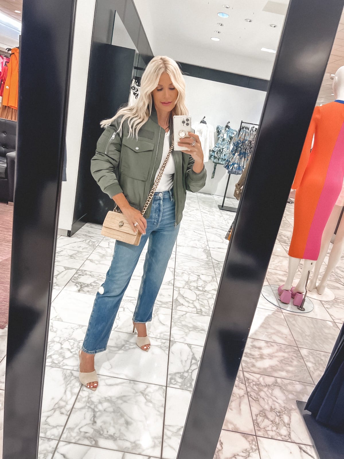 over 40 fashion blogger wearing redone jeans L'agence heels and bomber jacket in one of her Nordstrom Anniversary Outfits 2022