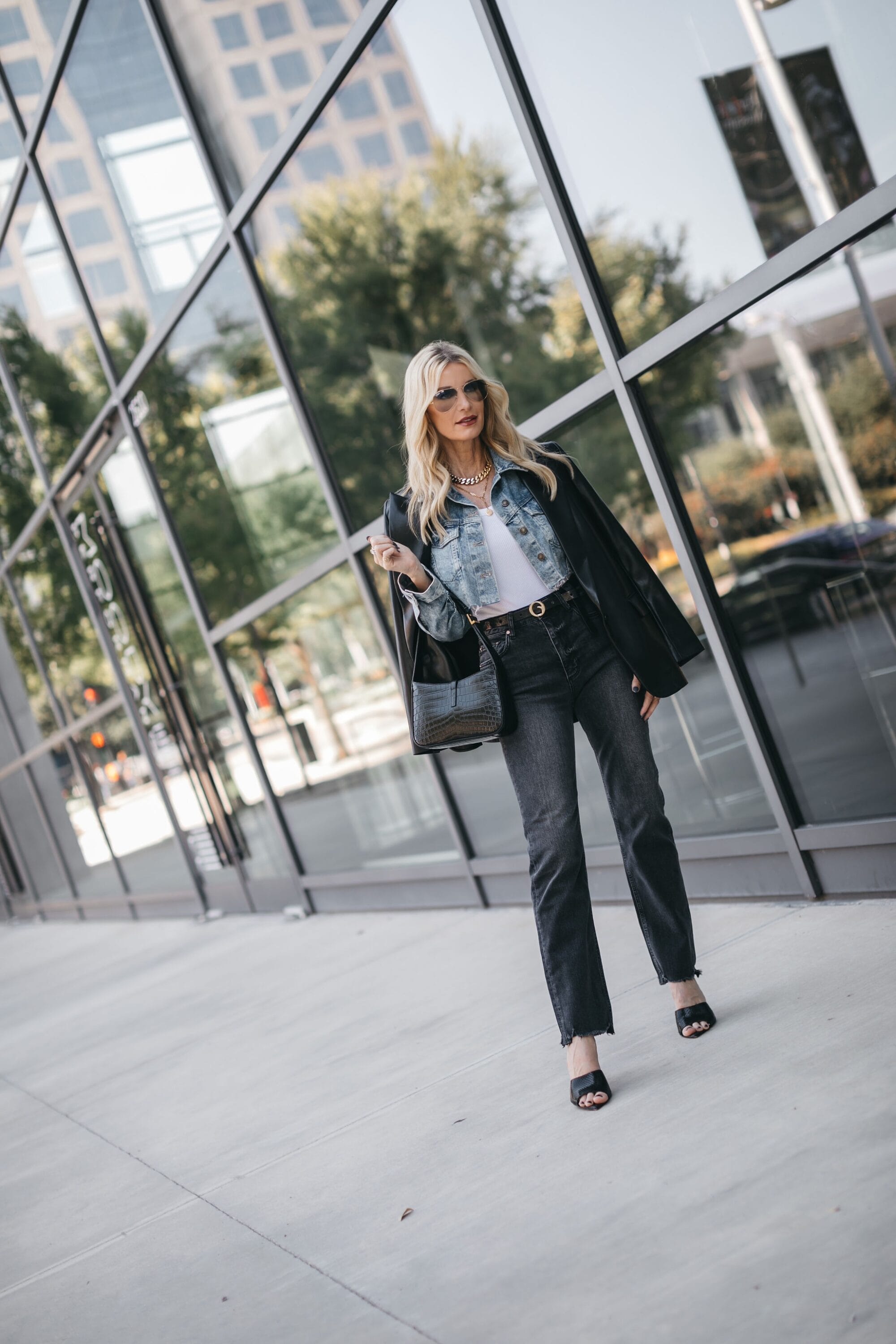 Dallas fashion influencer wearing Alice & Olivia blazer over free people denim jacket as one of 5 fall layering tips.