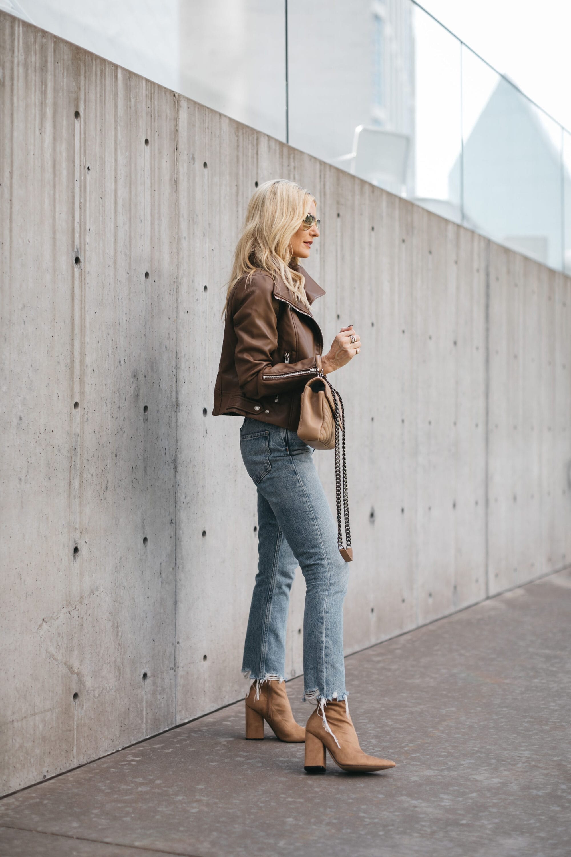 Dallas fashion blogger wearing best denim to wear with fall boots of 2022.