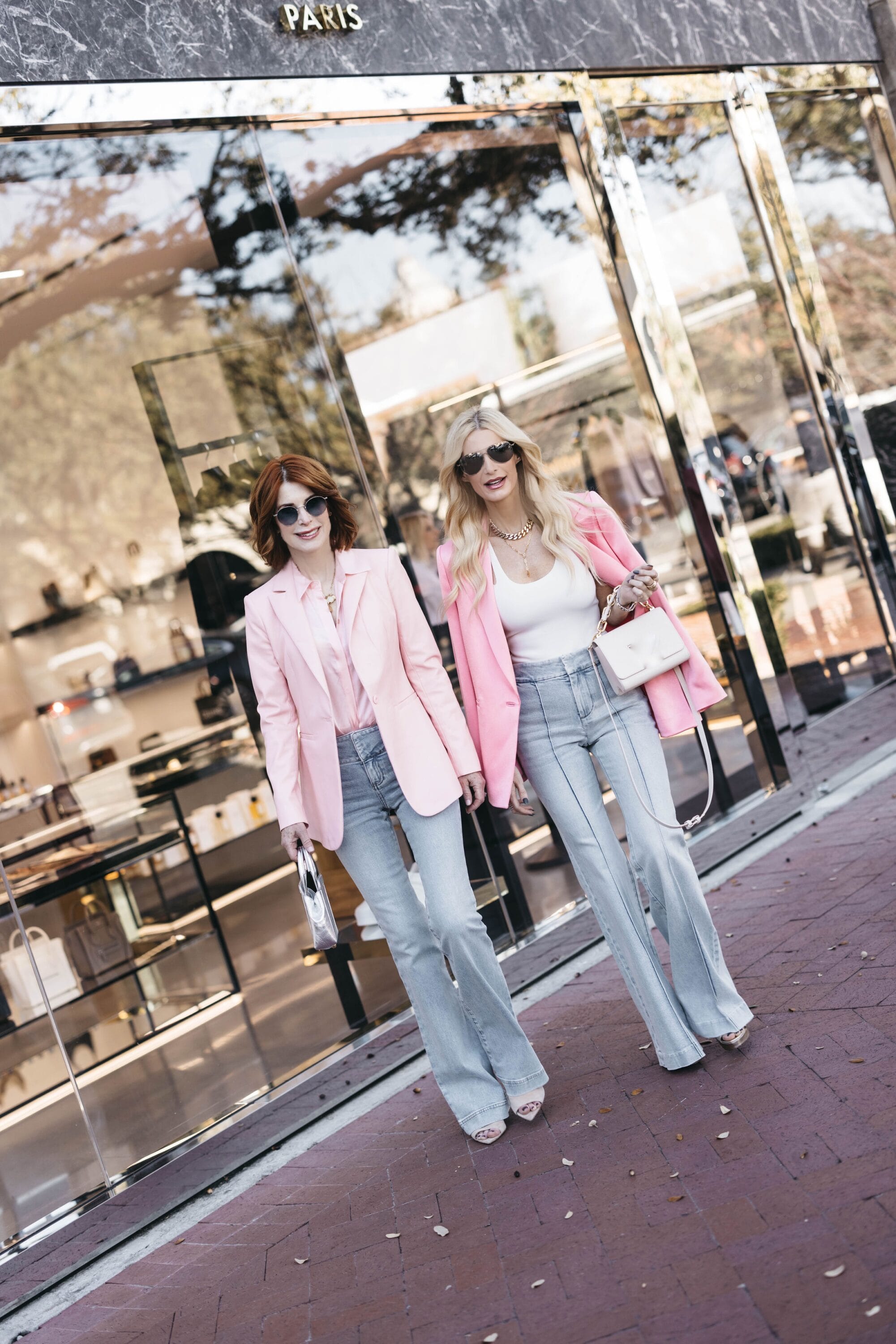Over 40 fashion influencers wearing pink blazers with light wash jeans as the perfect Galentine's Day Outfits