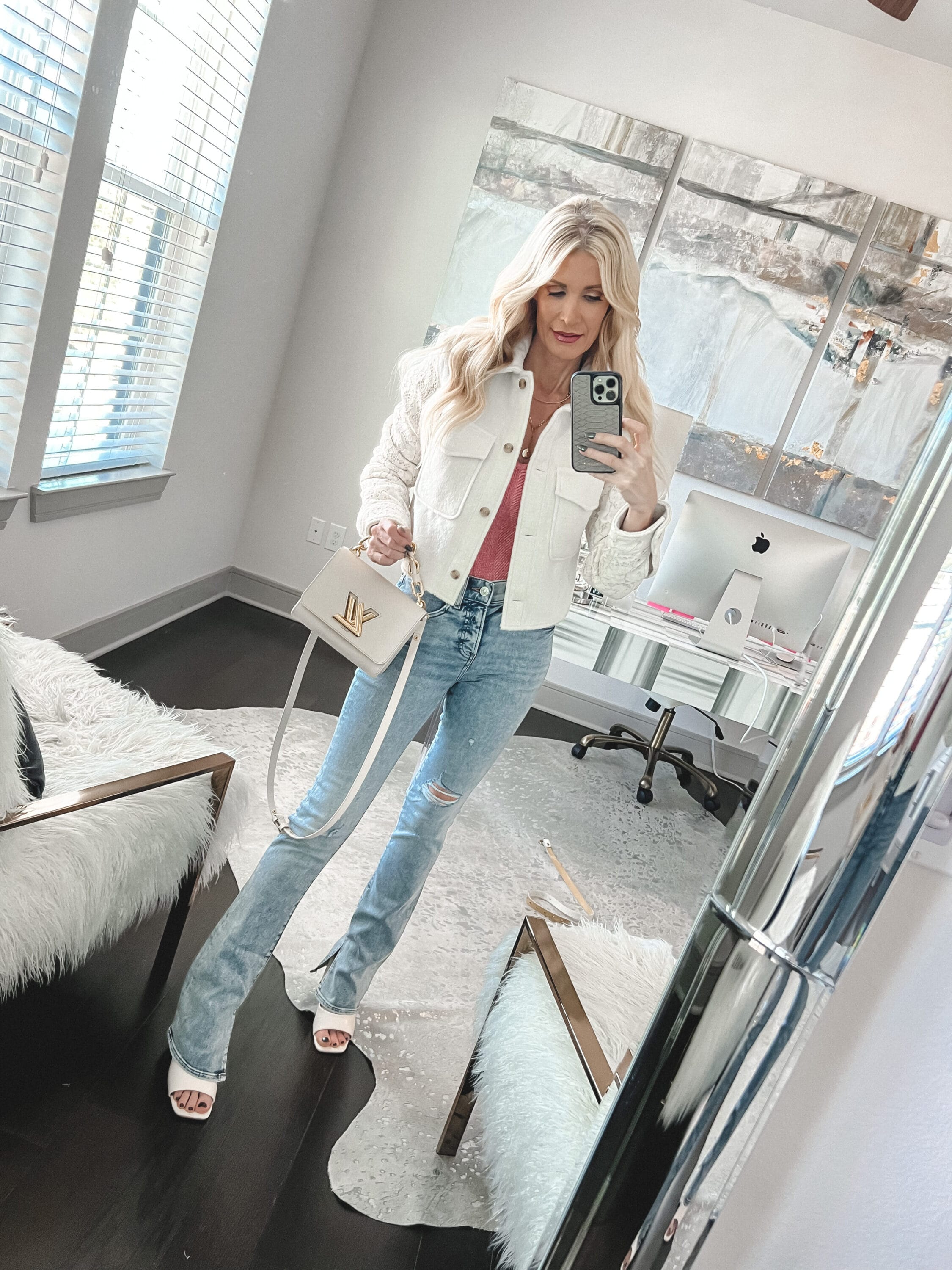 Over 40 Dallas woman wearing white lace shacket with skyscraper jeans as one of 5 Galentine's Day Outfits