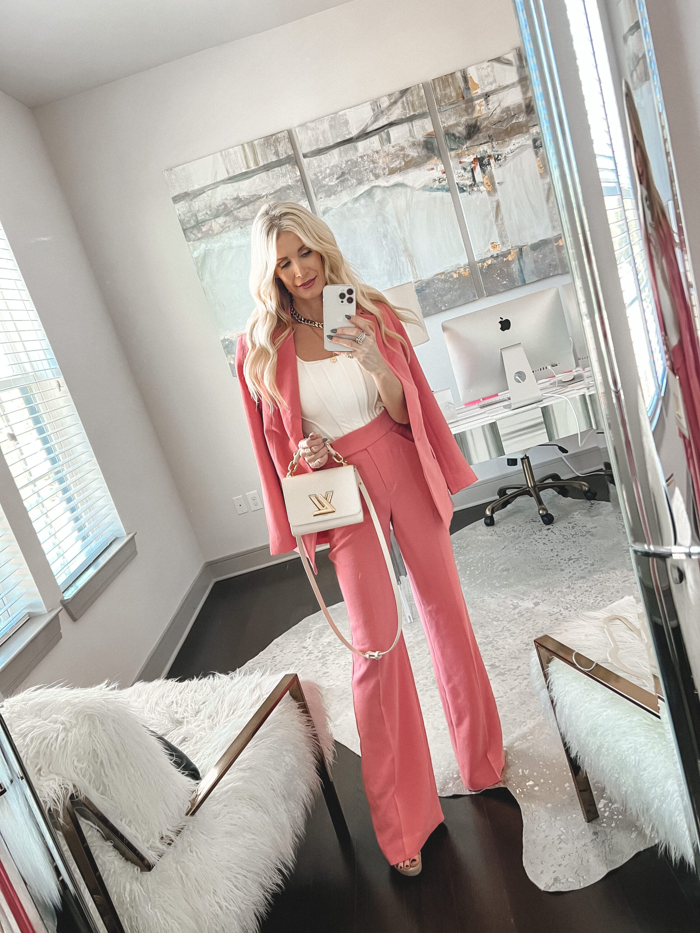 Over 40 fashion blogger from Dallas wearing pink twill blazer and matching pants from Express as one of 5 Galentine's Day Outfits.