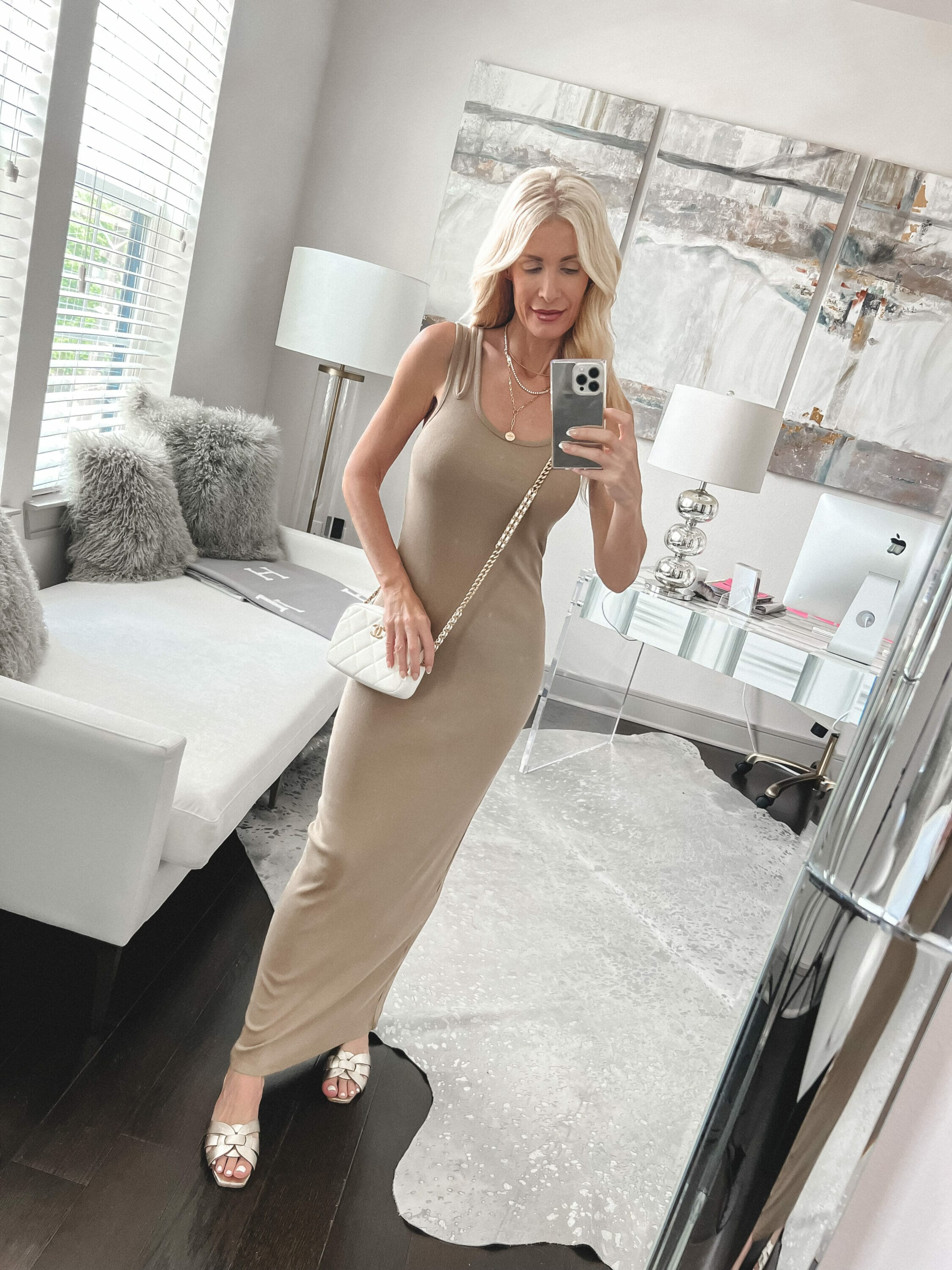 Dallas fashion influencer for the over 40 crowd wearing a tan midi dress with gold slides as a summer favorite part of the Nordstrom Anniversary Sale 2023.