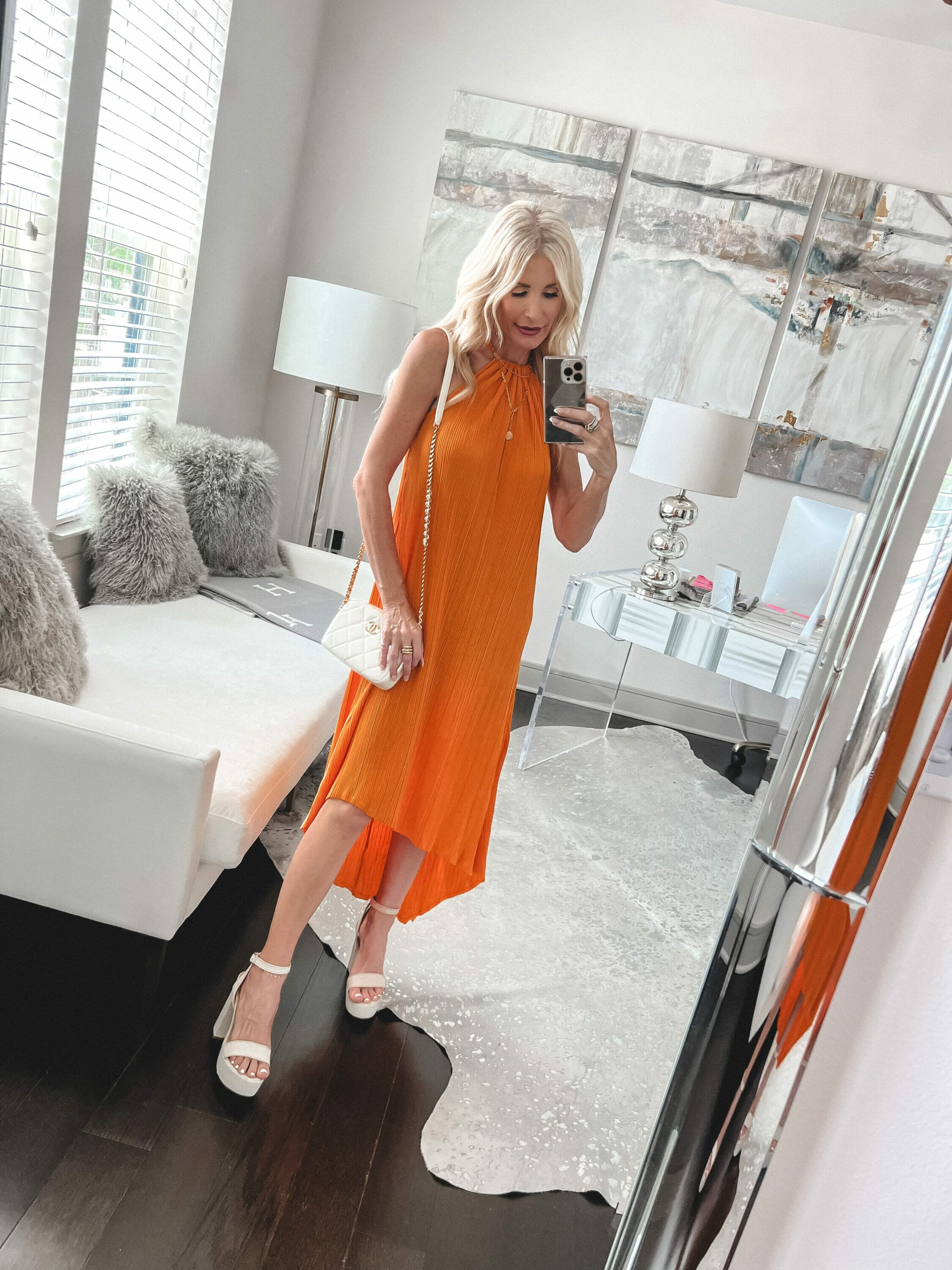 Over 40 fashion blogger wearing a orange midi dress from Walmart as one of 12 summer favorites from Walmart.