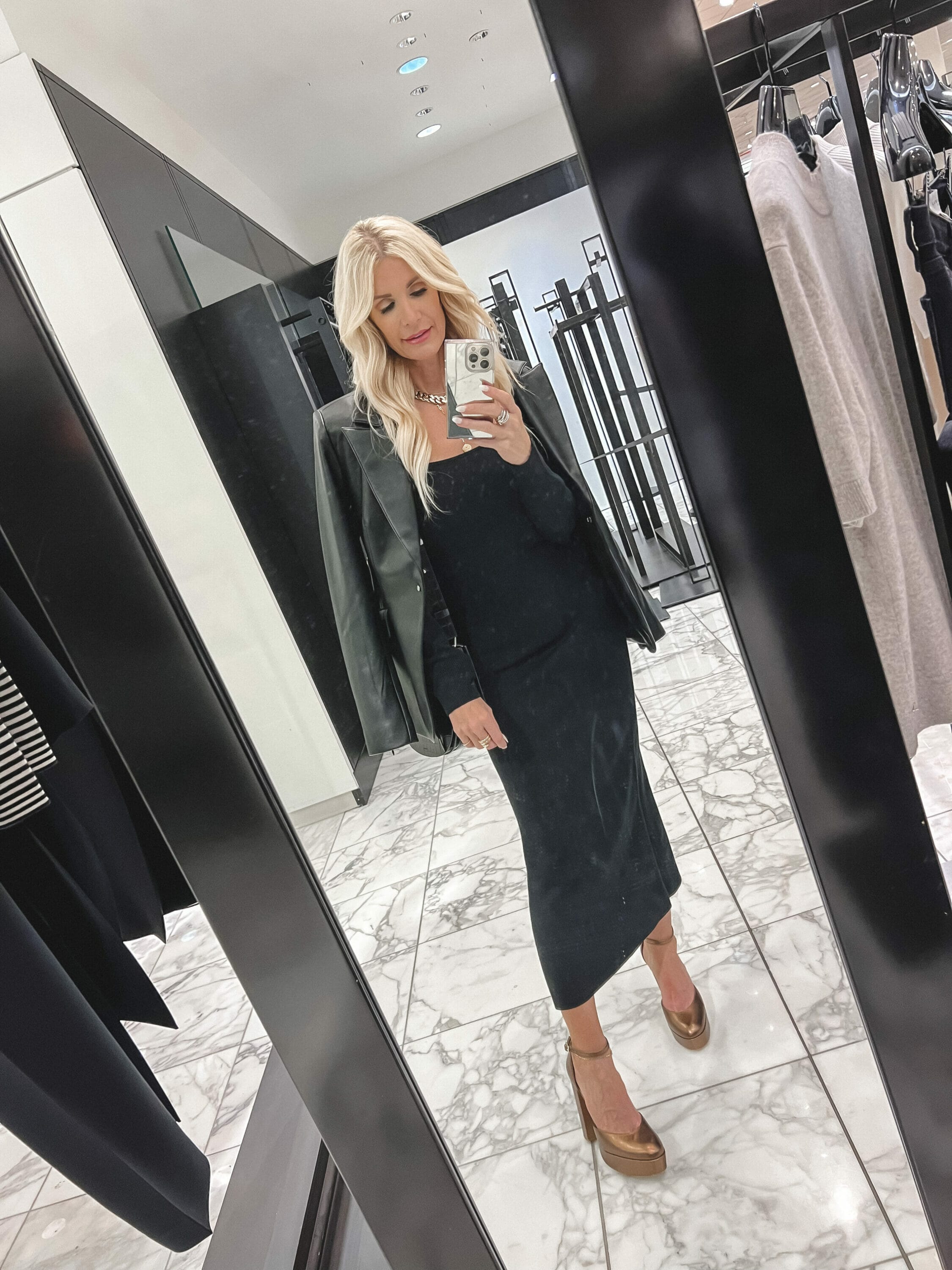 Over 40 fashion blogger wearing baby soft midi dress with a faux leather blazer as 2 of the best under $100 pieces from the Nordstrom Anniversary Sale.
