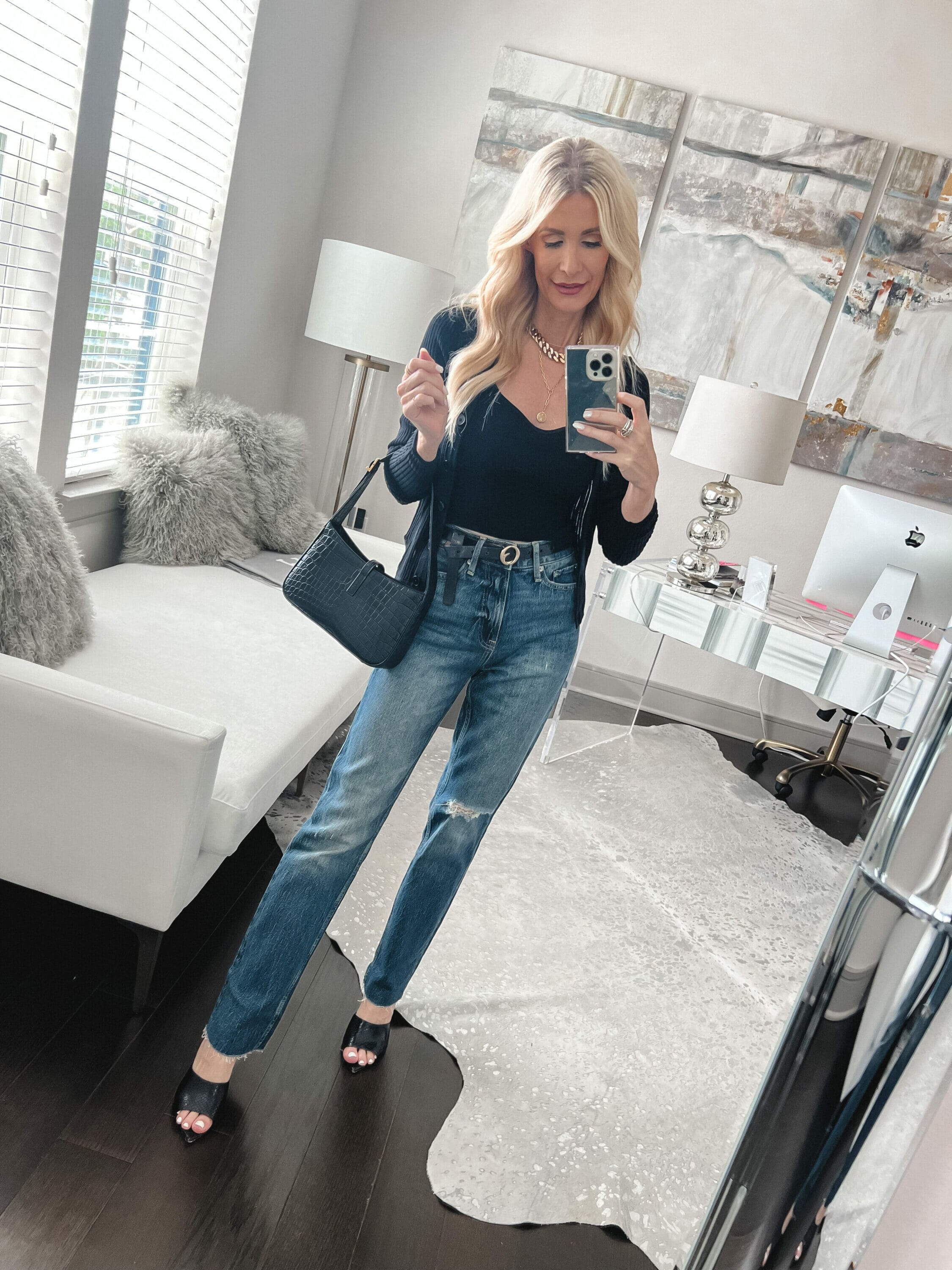 Over 40 fashion blogger wearing straight leg jeans and a black cardigan & tank set as 2 of the under $50 pieces your fall wardrobe will love.