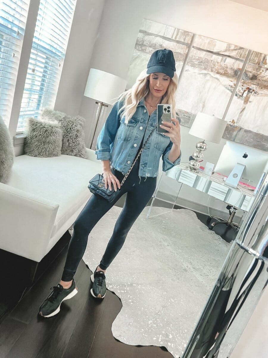 Over 40 fashion blogger wearing Spanx faux leather leggings as one of the best under $100 pieces from the Nordstrom Anniversary Sale.