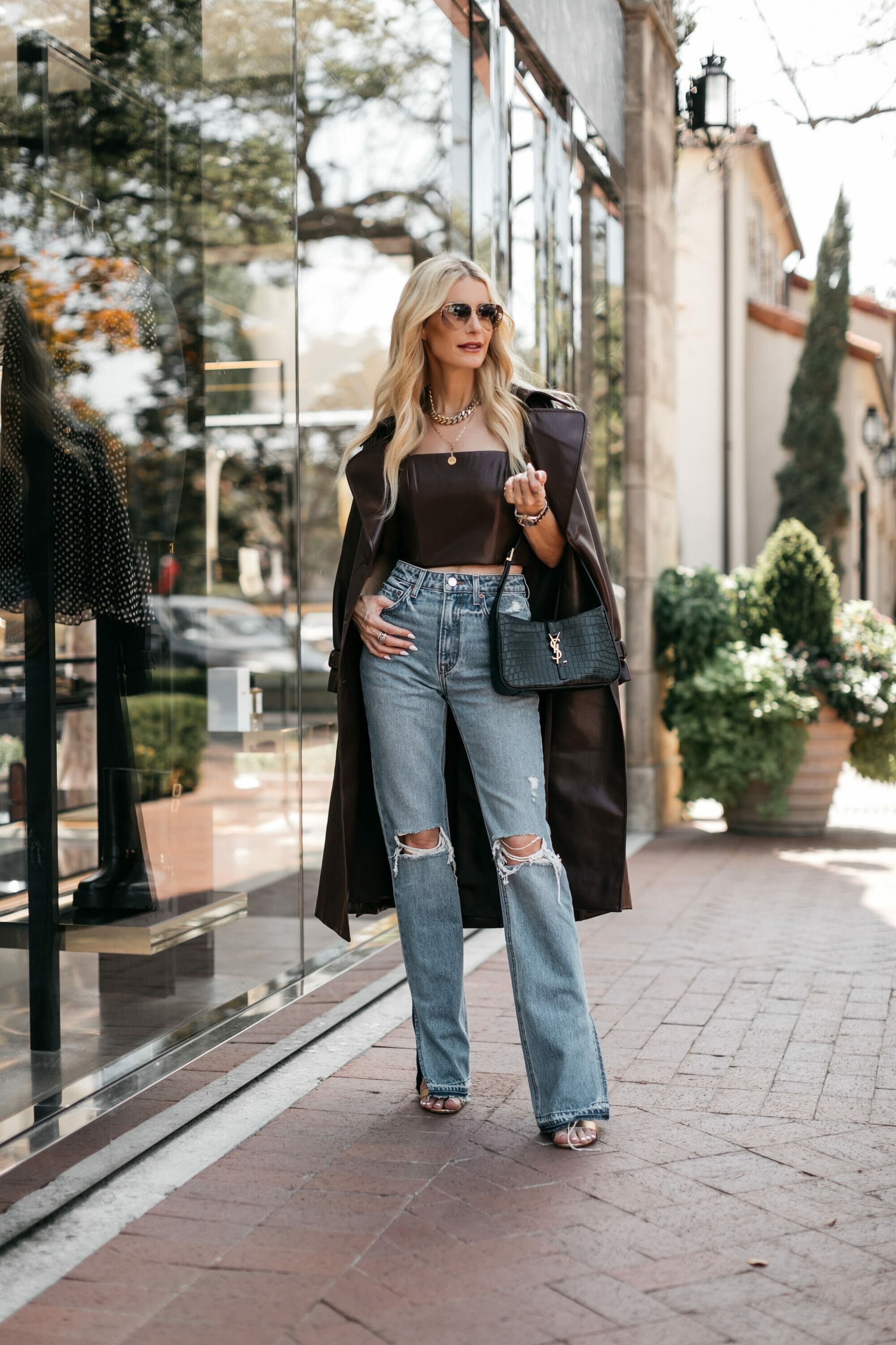 Over 40 fashion blogger showcasing her top 10 fall must-haves from the Saks friends and family sale.